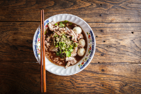 Thai noodle with soup on the tableの写真素材