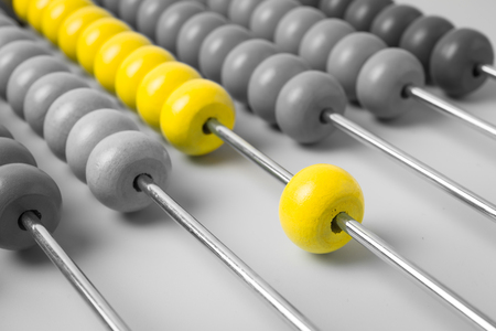 Abstract of wood abacus, focus at yellow colorの写真素材