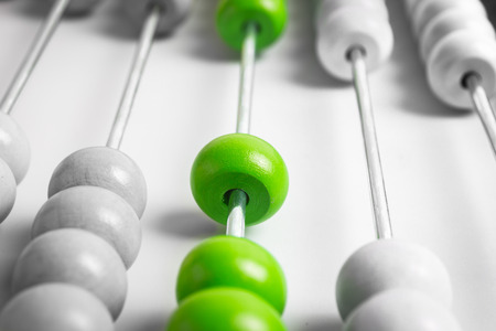 Abstract of wood abacus, focus at green colorの写真素材