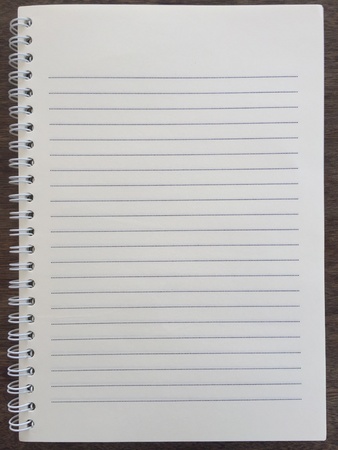 Notebook on wooden backgroundの素材