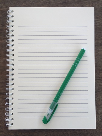 Notebook on wooden, background