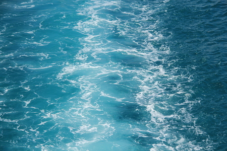 Background blue waves of the sea
