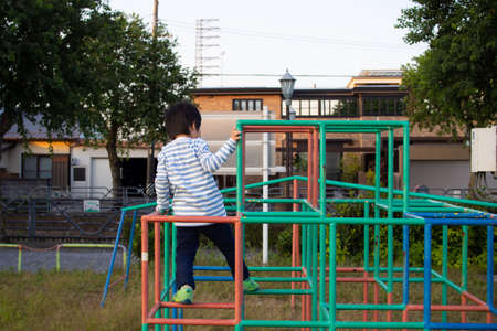 Japanese boy playing in a park in Gifu City, Gifu Prefectureの写真素材