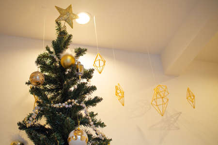 A beautifully decorated Christmas tree at home Japanの写真素材