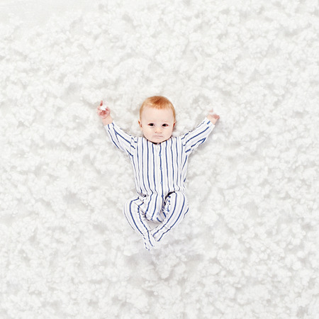 the lovely baby on a white backgroundの写真素材
