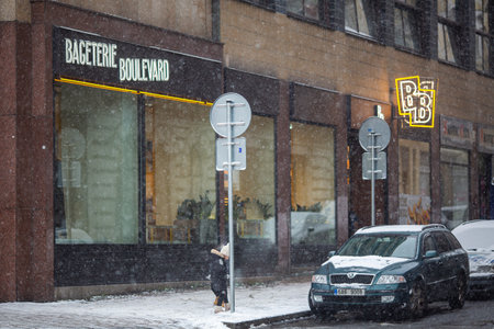 PRAGUE, Czech Republic - DECEMBER 12th 2022: Bageterie Boulevard restaurant on a Wenceslas Square, snowy Christmas timeのeditorial素材
