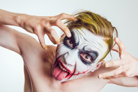 Man with Halloween face art on white backgroundの写真素材