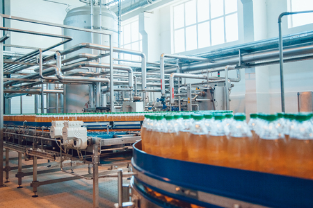 Beer bottles on the conveyor belt. Brewery.の写真素材
