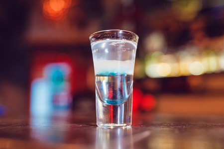 Alcohol shot Hiroshima on the bar.の写真素材