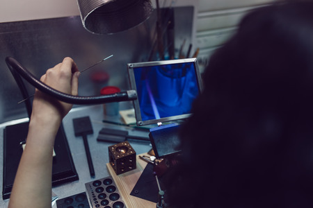 Process of manufacturing costume jewelery from Venetian glass.の写真素材
