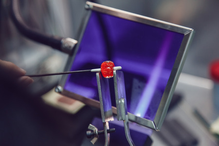 Process of manufacturing costume jewelery from Venetian glass.の写真素材