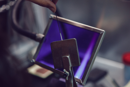Process of manufacturing costume jewelery from Venetian glass.の写真素材