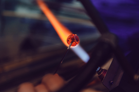 Process of manufacturing costume jewelery from Venetian glass.の写真素材