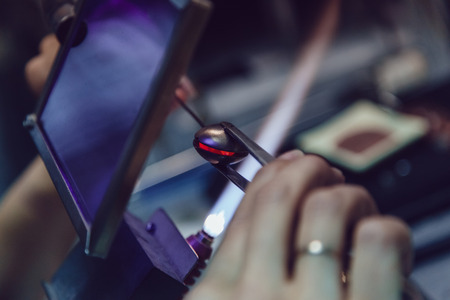 Process of manufacturing costume jewelery from Venetian glass.の写真素材
