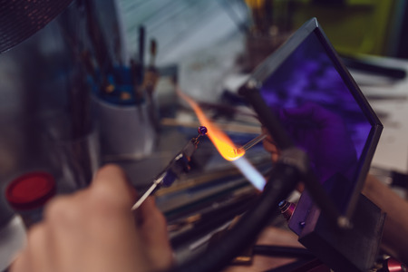 Process of manufacturing costume jewelery from Venetian glass.の写真素材