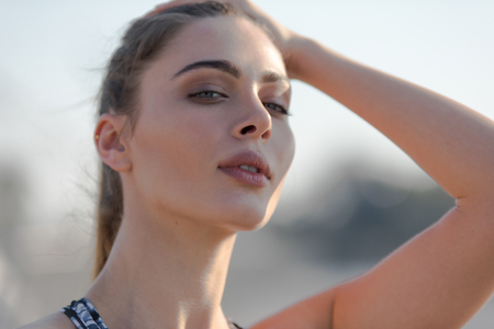Portrait of an attractive sports woman. Sport and healthy lifestyle concept.の写真素材