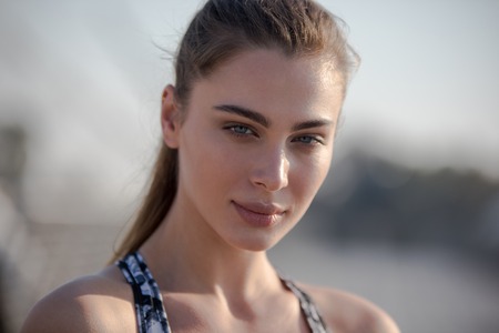 Portrait of an attractive sports woman. Sport and healthy lifestyle concept.の写真素材