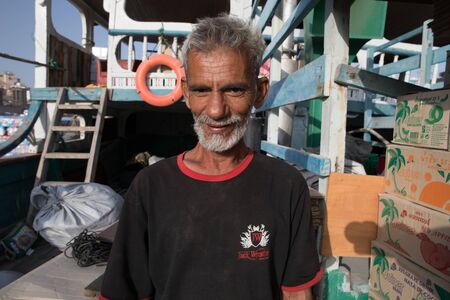 Dubai/UAE - March 13, 2018: Old workman in the Deira district.
