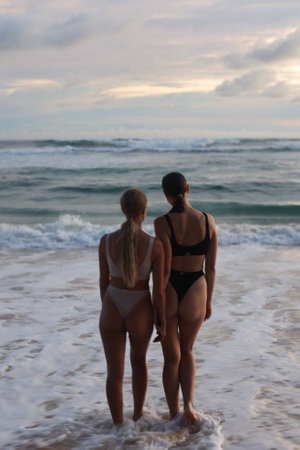 Experience the enchanting Sunset Beach Vibes while enjoying time with close friendsの写真素材