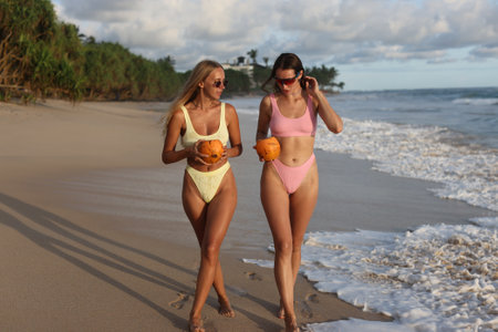 Enjoy a sunkissed beach adventure packed with fun and excitement with coconutの写真素材
