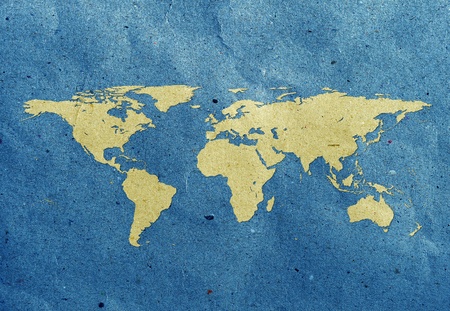 world map screen on recycled paperの写真素材