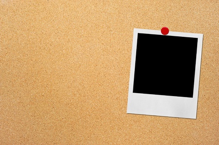 photo pinned to cork boardの写真素材