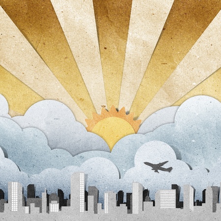 sunset and sunrise city panorama silhouettes recycled paper craft の写真素材