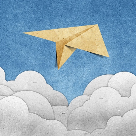aircraft  recycled paper on grunge blue sky paper backgroundの写真素材