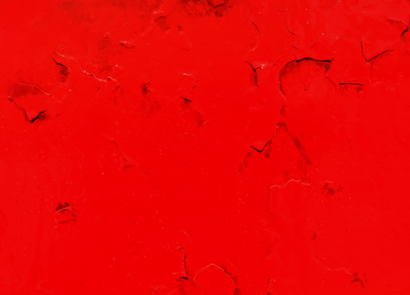 Grunge red paint wall textureの写真素材
