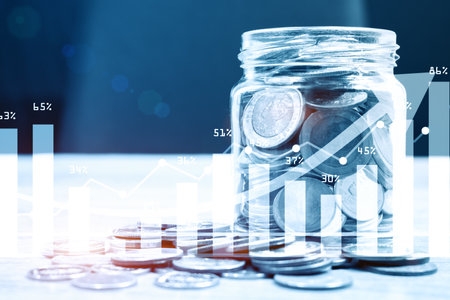 Coins in the glass. Saving money for finance accounting.

Financial investment with graph background concept. 3d renderingの写真素材