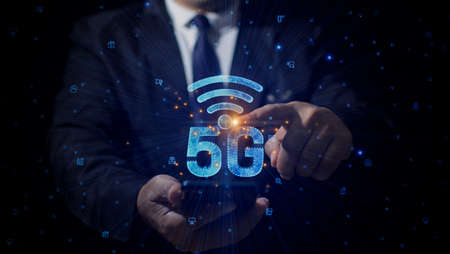 Double exposure businessman's touches icon 5g high-speed internet concept, Technology digital data...