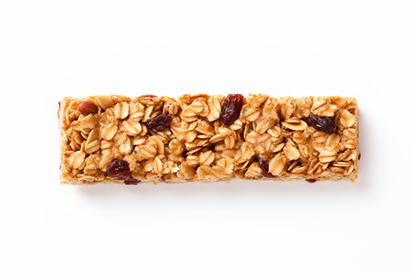 A granola bar with a mix of oats, nuts, and dried fruits isolated on transparent or white background, pngの素材