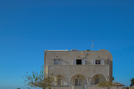 White house on the background of blue sky, Crete, Greeceの写真素材