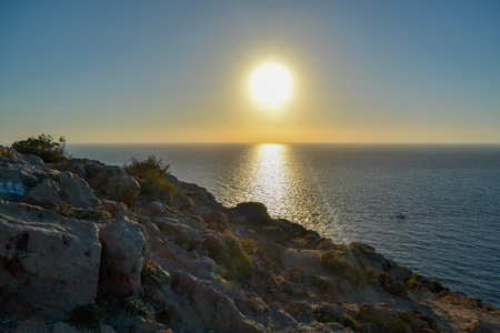 Sunset over the sea in Crete, Greece. Panoramic view.の写真素材
