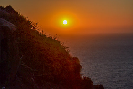 Sunset on the coast of the island of Madeira, Portugalの写真素材