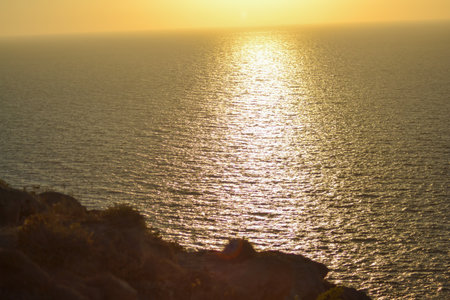 Sunset over the Mediterranean Sea in Tarragona, Spainの写真素材
