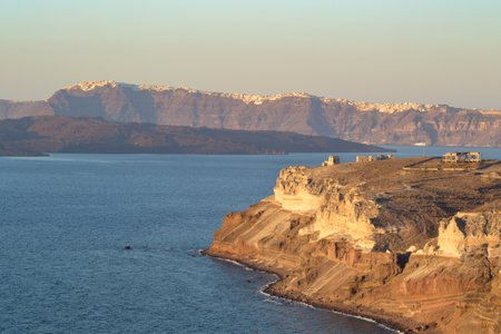 Santorini, Greece. Volcanic rock formations at sunset.の写真素材
