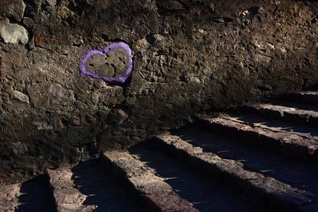 heart painted on stone wallの写真素材