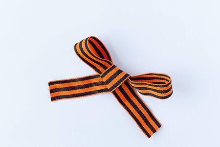 9 May, Victory Day. George ribbon and blossoming branch of a cherry .
