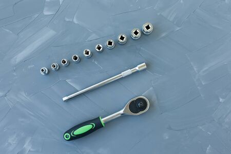Set of tools. A set of screwdrivers with lots of parts. Male tool kit. Shiny, silver metallic...