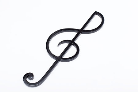 Black treble clef on a white background. Music symbolの写真素材