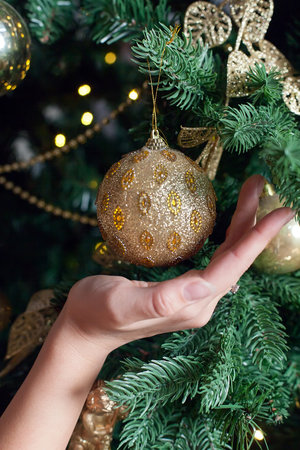 Decorated Christmas tree on blurred, sparkling and fairy backgroundの写真素材