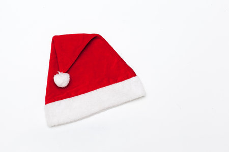 Single Santa Claus red hat isolated on white background.の写真素材