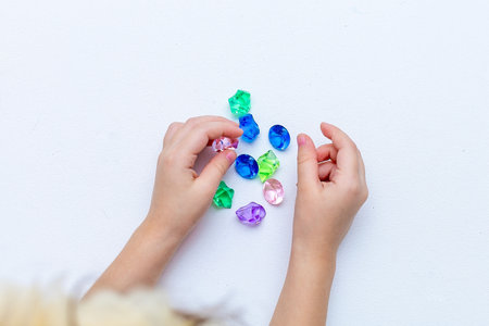 Colourful childs bead bracelet, isolated on a white background