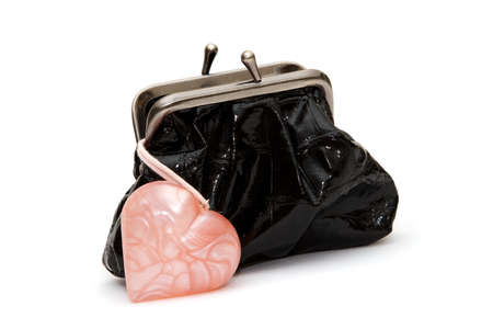 Isolated black purse and pink heart