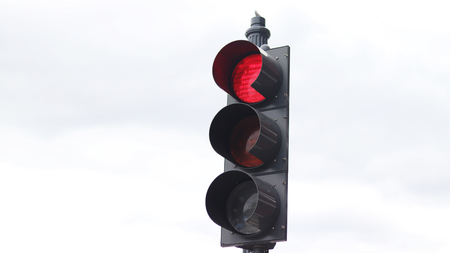 A red light is lit at the traffic lightの写真素材