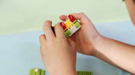 The boy hand on the blockの写真素材