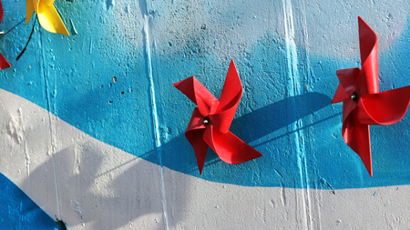 Mural and red pinwheelの写真素材