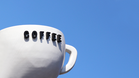 Coffee words written on whiteの写真素材