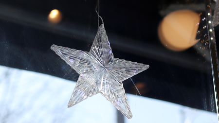 The star decorations in the carnival on the dark background.の写真素材